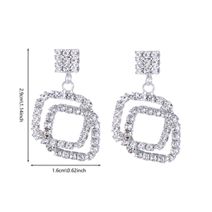 Square silver stud earrings with double interlocking geometric rhinestone pendants