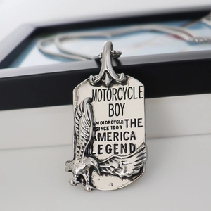 Silver vintage eagle dog tag pendant with Motorcycle Boy and America Legend relief