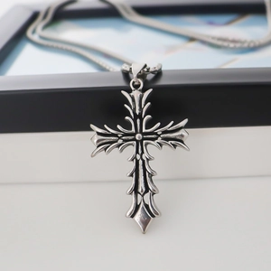 Vintage gothic stainless steel cross necklace with sharp thorn details in antique silver