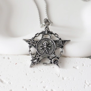 Gothic silver star necklace with skull emblem and Masonic compass on a white background