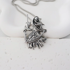 Vintage silver Grim Reaper skull pendant necklace with scythe for men in hip hop style