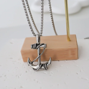 Vintage stainless steel anchor necklace with nautical rope detail and box chain style