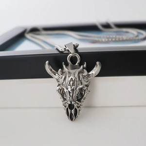 Gothic dragon head pendant necklace in stainless steel with a metallic hexagram engraving