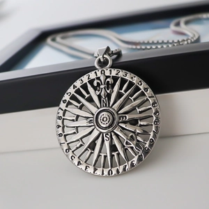 Vintage silver compass necklace pendant with nautical engraving and antique finish