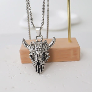 Punk titanium steel necklace featuring a realistic bull skull pendant on a box chain