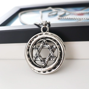 Vintage silver compass necklace for men featuring a hexagram pendant and beaded chain