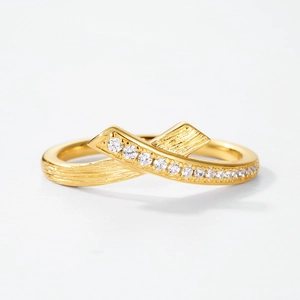 Elegant gold S925 silver ribbon ring with brushed texture and sparkling zircon stones