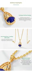 Macro detail of vintage teardrop lapis lazuli pendant with gold plating and engraving