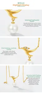 Detailed view of S925 silver bird pendant with white zircon and a freshwater pearl drop