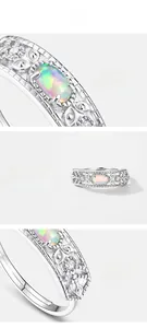 Detailed macro view of S925 sterling silver ring with oval opal and engraved details