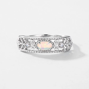 Vintage S925 silver ring featuring an oval opal stone with symmetric side crystals