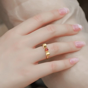 S925 sterling silver gold plated bow ring with red heart gemstone and brushed finish