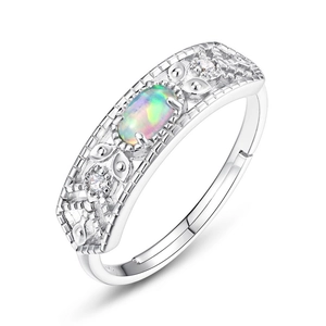 Vintage S925 sterling silver adjustable ring featuring oval opal and side zircons