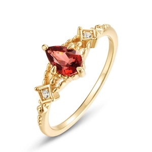 Anello vintage in argento S925 con granato a pera e diamanti laterali in oro