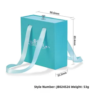 Detail view of sky blue drawer gift box showing dimensions 90.6mm and 53g weight
