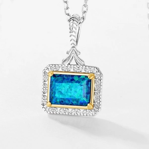 Elegante S925 zilveren ketting met blauwe opaal hanger en verfijnde bladtextuur details