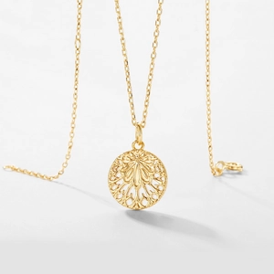 Elegant hollow leaf pendant necklace in gold finish with thin chain for women