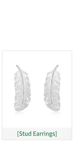 Macro shot of silver S925 feather earrings with detailed brushed texture and leaf pattern