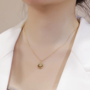 Minimalist S925 sterling silver necklace with a sun-shaped hollow leaf pendant