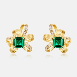 Vintage ribbon earrings in gold finish with square emerald gemstone and tiny diamonds