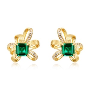 Vintage ribbon earrings with square emerald gemstones and brushed gold finish
