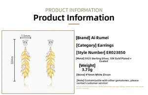 Detail view of wheat-shaped silver earrings with white zircon and size annotations