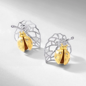 Elegant S925 silver ladybug on leaf stud earrings with matte gold finish and zircons