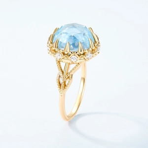 Bague en argent S925 plaqué or avec topaze bleue et pierres d'accent étincelantes