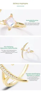 Detailed macro view of S925 silver crescent moon ring with square moonstone and gold plating