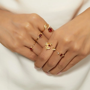 Elegant S925 silver gold-plated rings with red stones and floral leaf designs