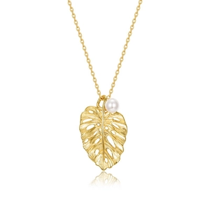 Elegant gold monstera leaf necklace with pearl pendant in a vintage French style
