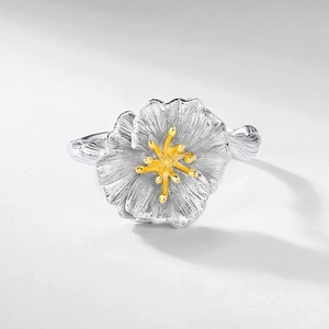 Handcrafted S925 silver hibiscus ring with brushed petals and golden center