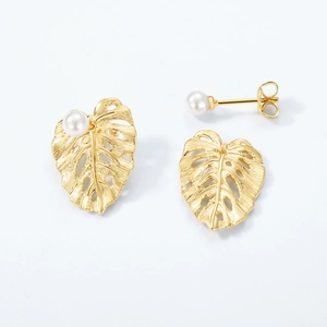 Golden brushed leaf earrings with pearls, featuring a vintage hollow texture on white background