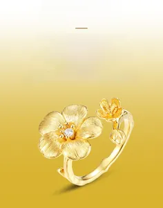 Close-up of S925 sterling silver brushed flower ring with a sparkling center stone