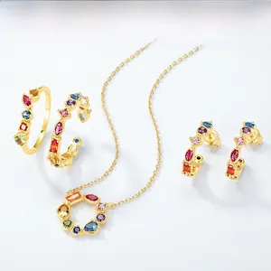 Macro shot of S925 silver jewelry set with colorful zircon stones and gold plating