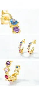 Macro detail of S925 sterling silver C-hoop earrings with multi-color nano zircon stones
