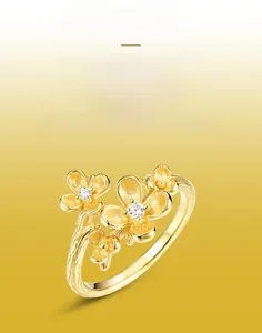 Detailed view of handmade brushed S925 silver flower ring with white gemstones