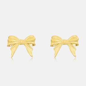 Elegant gold bow earrings with brushed metal texture and a minimalist ribbon design