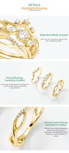 Macro detail of S925 silver gold-plated ring set with natural clear crystals