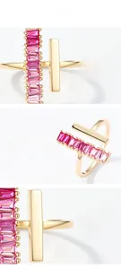 Detailed macro of S925 silver gold-plated ring with pink sapphire and polished gold bar