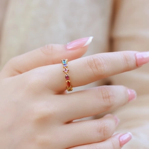 Luxurious S925 silver ring with colorful zircons and gold plating on a model hand