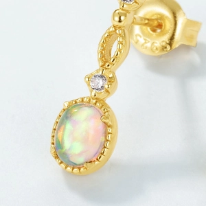 Vintage S925 sterling silver gold earrings featuring oval opal stone and small crystals
