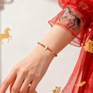 S925 sterling silver zodiac horse bracelet with red agate beads on a model wrist