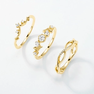 Three-piece gold plated S925 silver ring set with natural white crystals and crown design