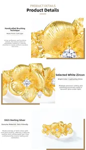 Detail of S925 silver jasmine flower ring with handmade brushed gold and white zircon