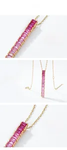 Detailed macro view of gold-plated silver pendant with gradient pink stones