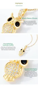 Détails macro du pendentif chouette en argent S925 avec zircons blancs et noirs