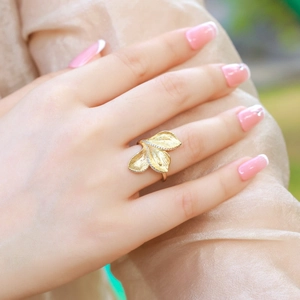 Handcrafted vintage leaf ring in gold plated silver with brushed texture and zircon stones