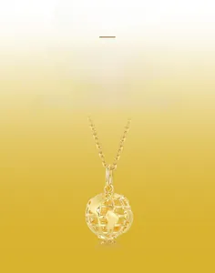Detailed view of globe pendant with handmade brushed texture and continent cutout details