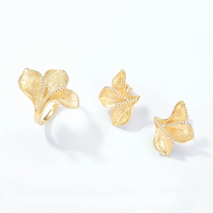 Artistic leaf jewelry set with gold brushed texture and white zircon stone inlay